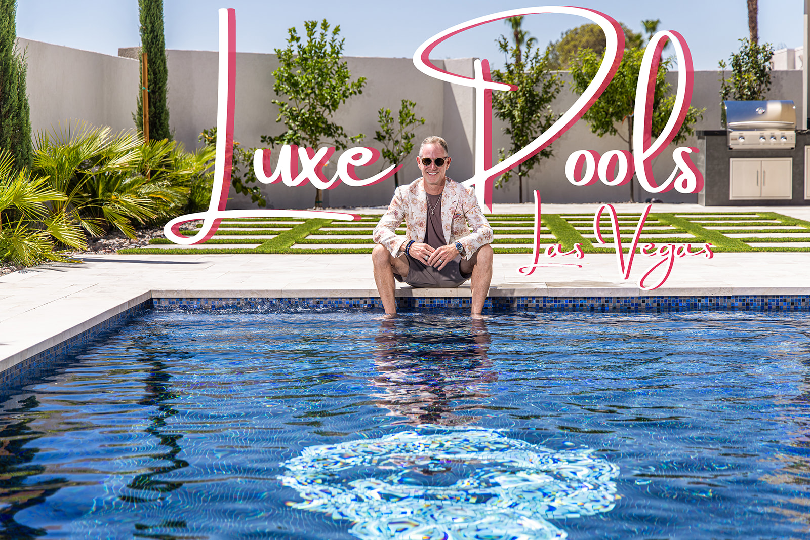 Jonny Moore seated poolside during the Modern Luxury Vegas photo shoot
